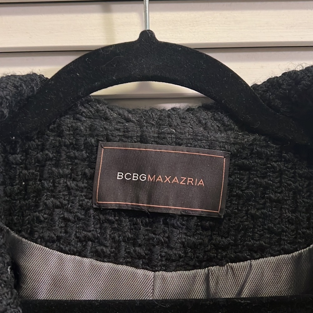 Small, black BCBG Maxazria mid length women’s jacket